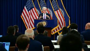 Divided US Fed makes third straight rate cut on jobs risks