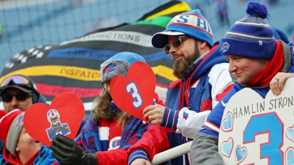 Bills win NFL return amid tributes for hospitalized Hamlin 