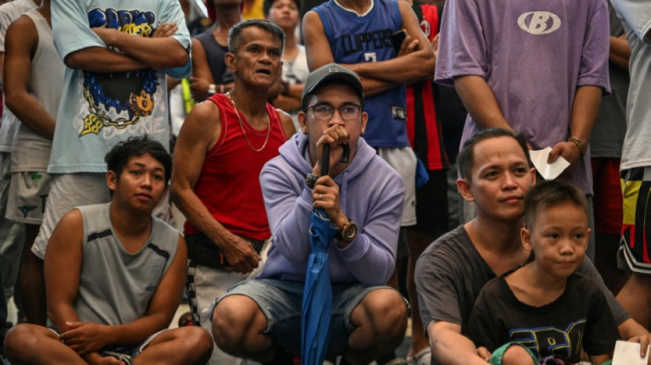 Manila crowd cheers Pacquiao comeback, draw and all