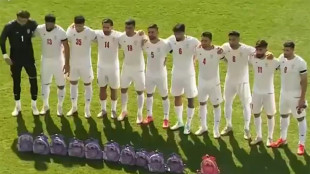 Iran footballers pay tribute to victims of school strike