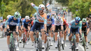 Vernon avoids crashes to win Tour Down Under stage in brutal heat
