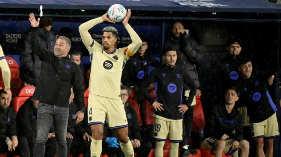 Barcelona's Araujo heads to Liverpool on loan
