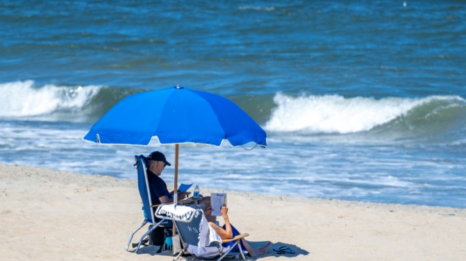 As Trump faces indictment heat, Biden chills beachside