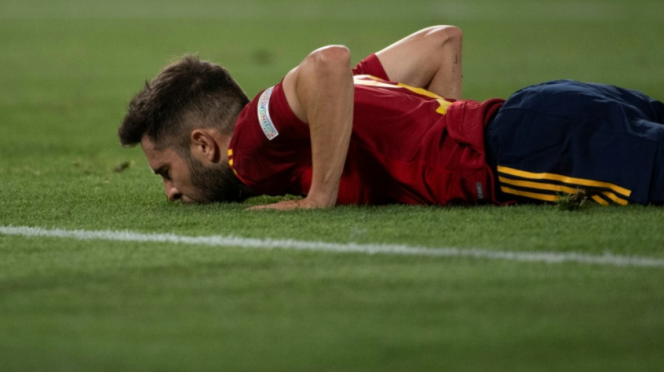 Spain pegged back by late Portugal equaliser