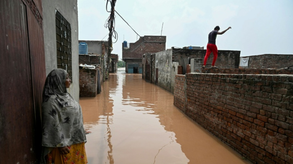 Smog then floods: Pakistani families 'can't catch a break'