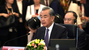 Top US, Chinese diplomats meet at ASEAN talks as tensions risk flaring