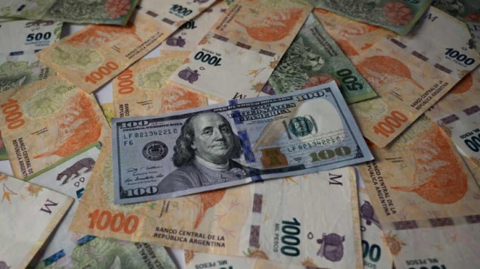 Argentina devalues peso after shock primary election result