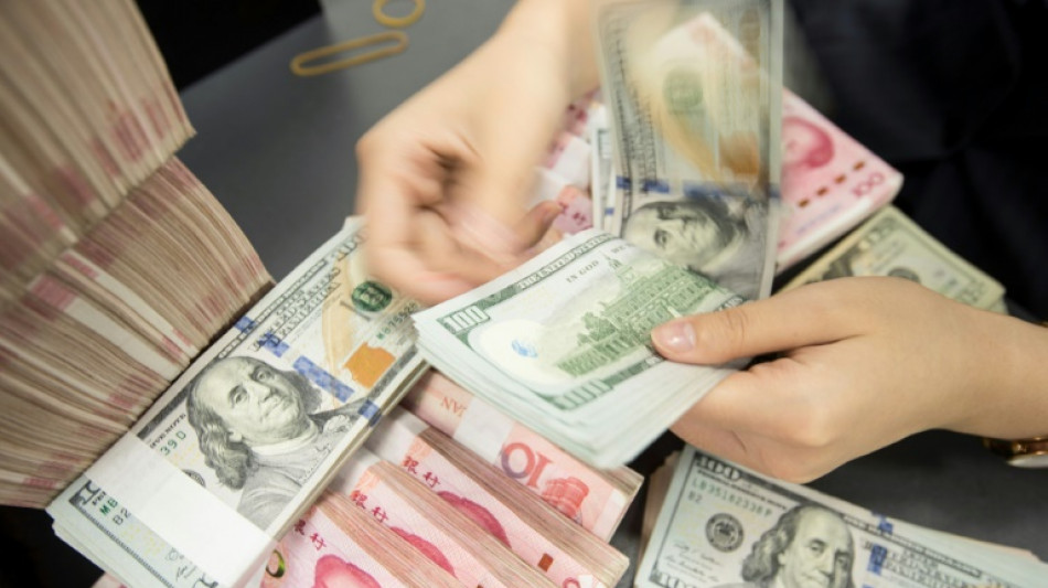 China's offshore yuan hits record low against dollar