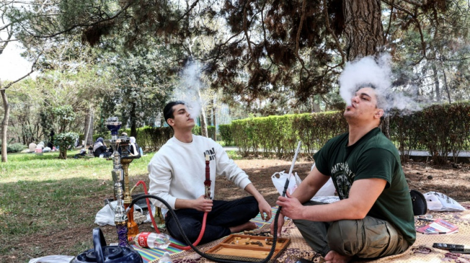 Music and barbecues in Tehran despite Trump threats 