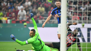 Leao claims derby honours for leaders Milan, Napoli retake top spot