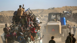 Los palestinos vuelven a una Ciudad de Gaza devastada