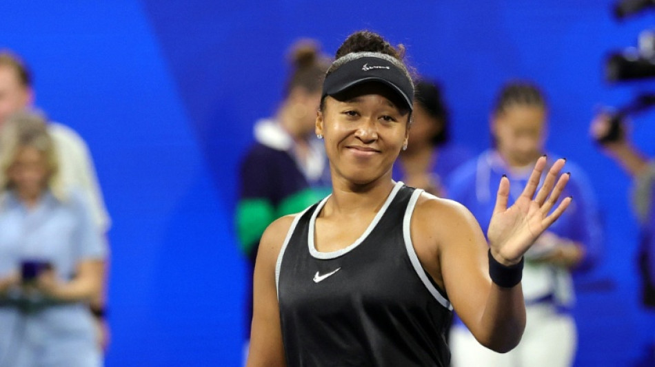 Wobbly Osaka 'shocked' to battle past Mertens and reach last 16