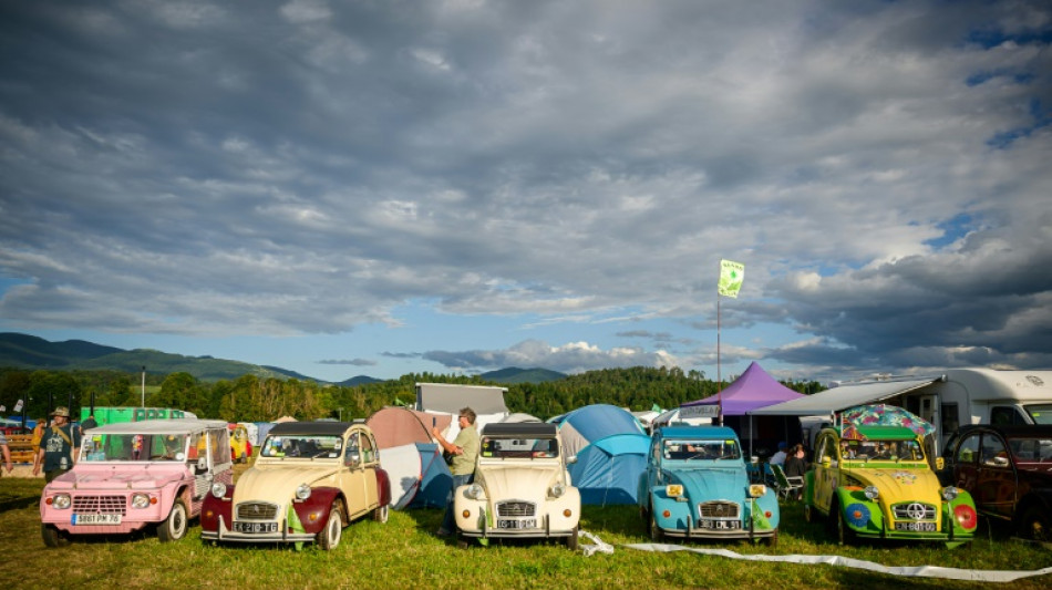 Citroen 2CV lovers gather in Slovenia to take the slow road