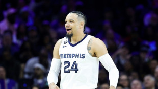NBA Grizzlies' Brooks fined for shoving camera carrier