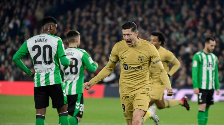 Barca earn tense win at Betis to extend La Liga lead