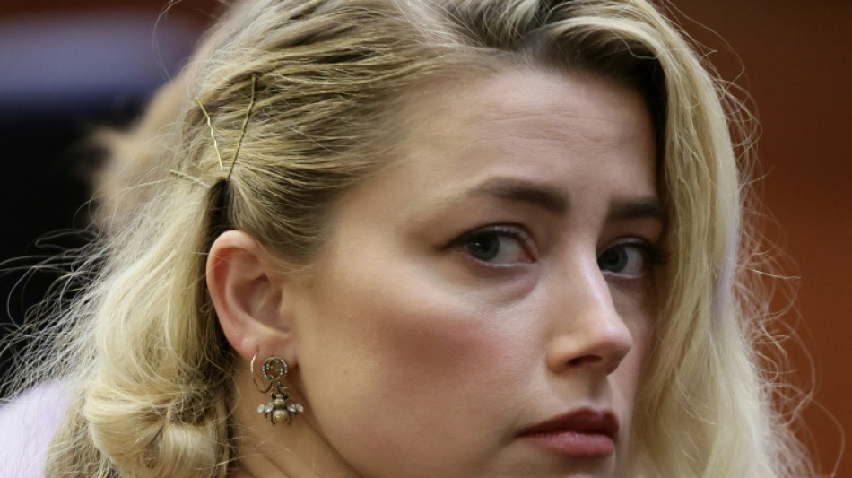 Amber Heard settles defamation case with ex Johnny Depp