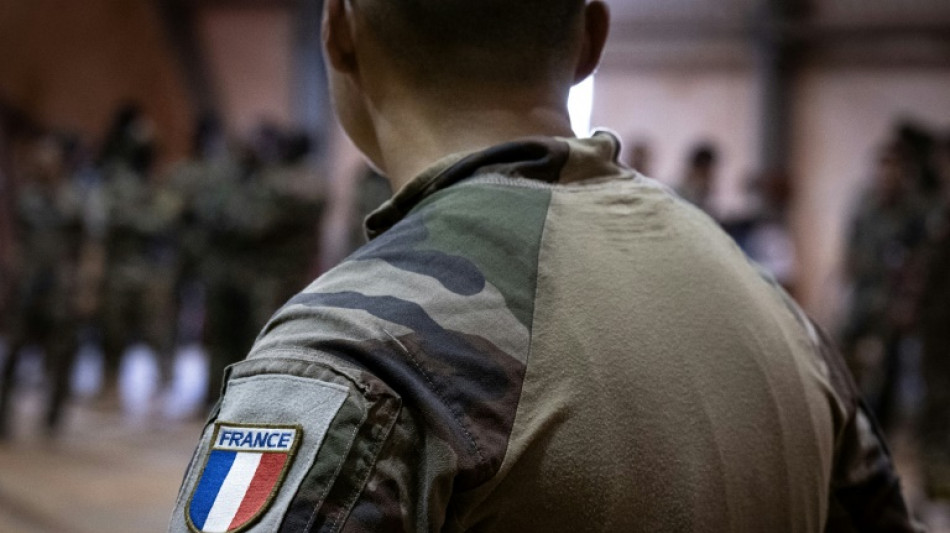 France softens tone on Niger coup