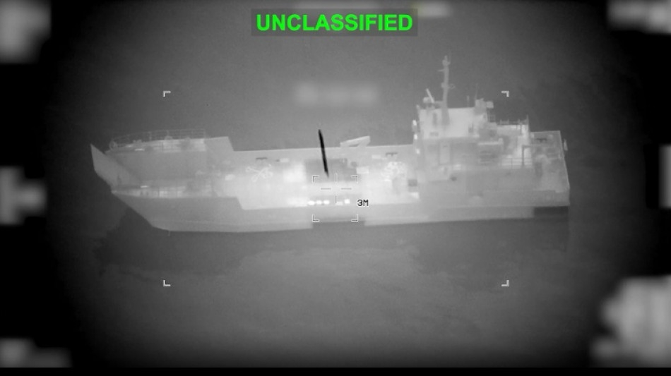 Trade ships hit as Iran threatens Gulf oil chokepoint