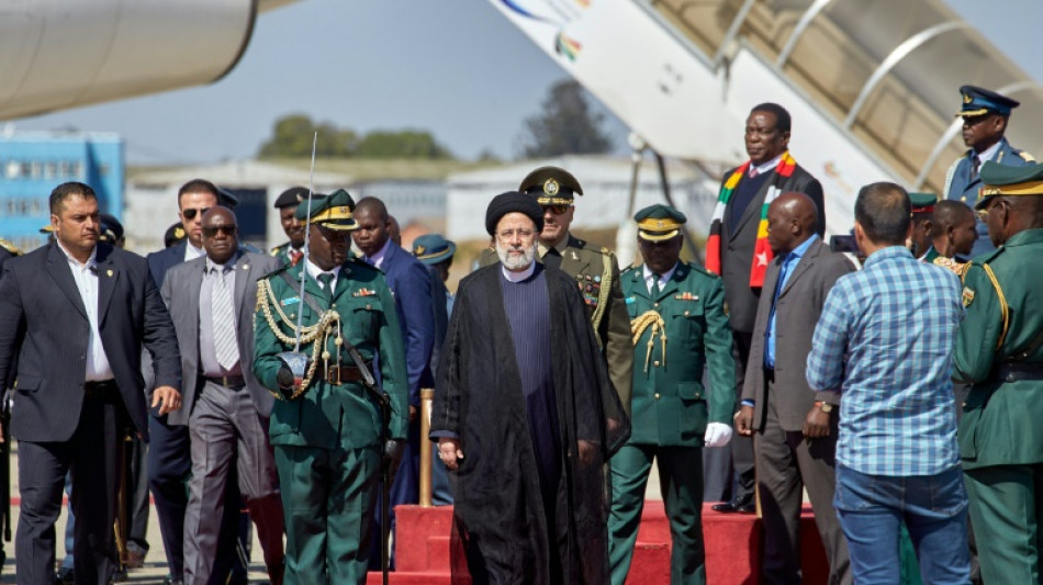 Iran's Raisi visits fellow outlier Zimbabwe ahead of key vote