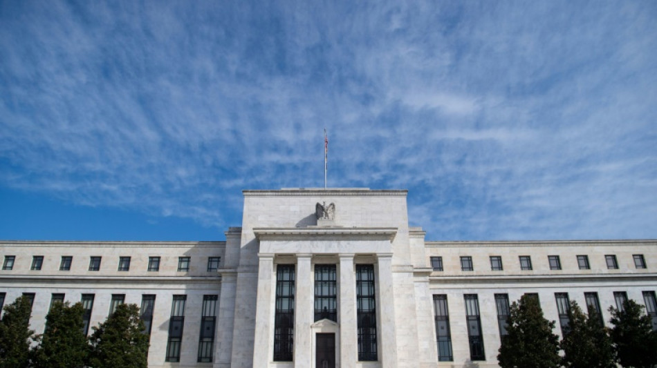 Wall Street mixed while Europe sinks on renewed rate worries