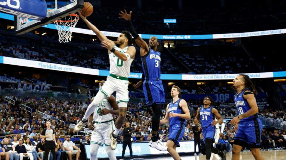 Celtics down Magic for third straight win, Spurs shock Sixers
