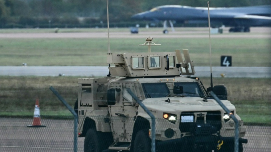 UK police say releasing on bail five men held over airbase incident