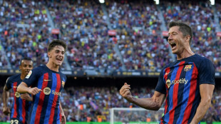 Lewandowski bags double for 'blessed' Barca, Benzema strikes late for Real 