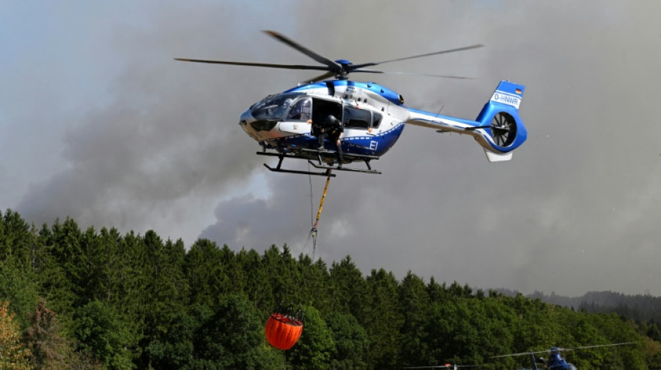 Wind spurs forest fire in western Germany, with scores evacuated