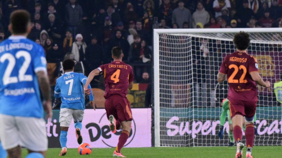 Napoli beat rivals Roma to join Milan at Serie A summit