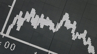 Asian markets mixed as inflation, rate worries temper rally