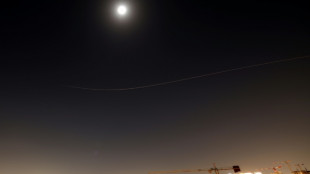 Iran fires missiles across Middle East as Trump threatens oil hub