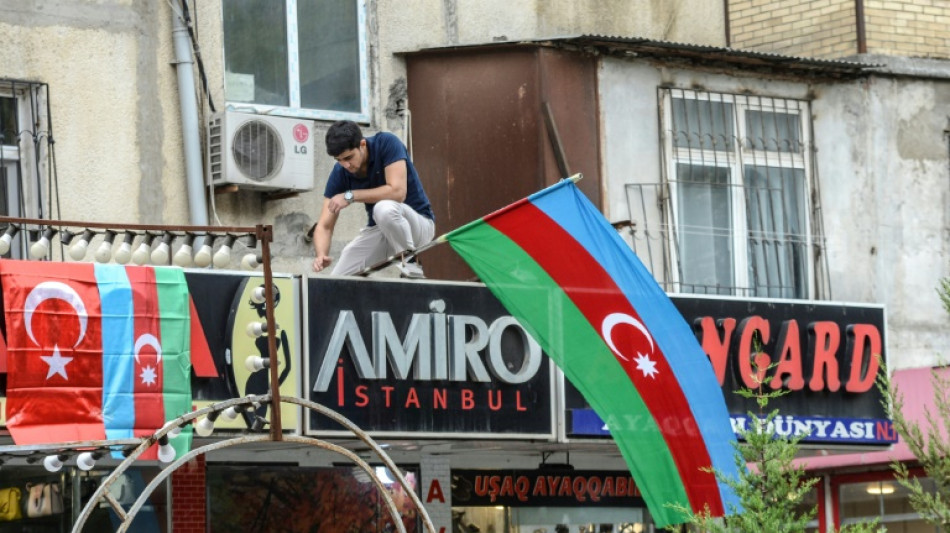 Azerbaijan halts Karabakh operation after separatists surrender